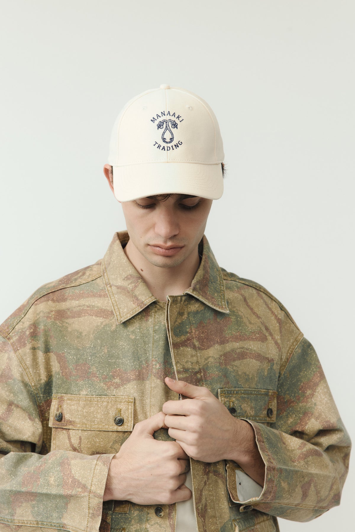 Manaaki Trading Emblem Cap - Off White