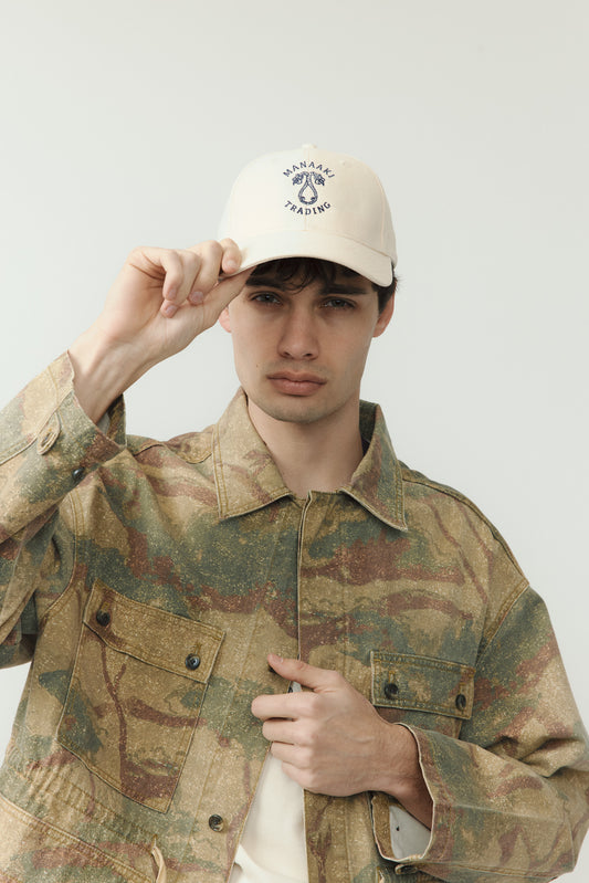 Manaaki Trading Emblem Cap - Off White