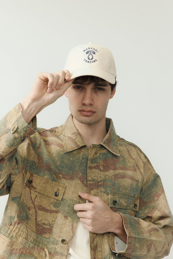 Manaaki Trading Emblem Cap - Off White