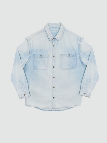 Light blue denim shirt on a white background