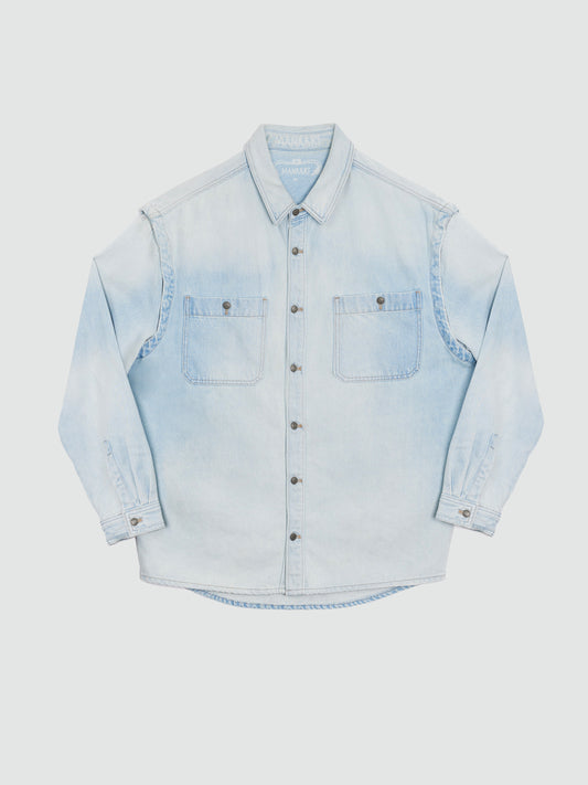Light blue denim shirt on a white background
